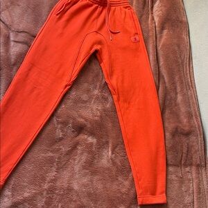 Savage X Fenty Unisex Fleece Jogger Pants in Orange Tempo